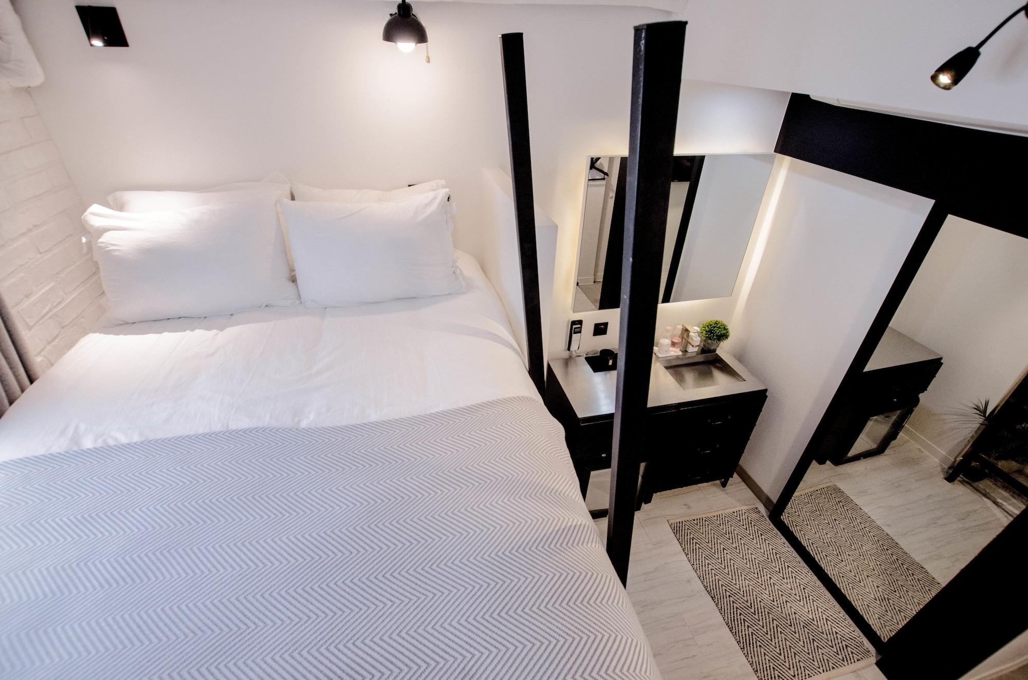 เอ็มมิโอ 2 ดีไซน์ เรสซิเดนซ์ มย็องดง Hostel โซล ภายนอก รูปภาพ